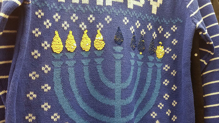 A Sweater That Lets You Light The Menorah